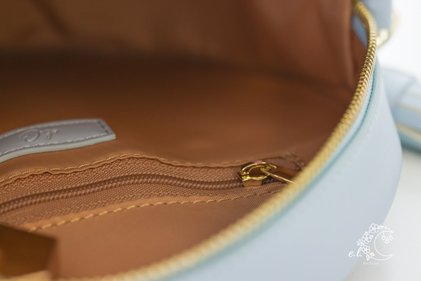Laser Cut Elephant Foot Round Crossbody