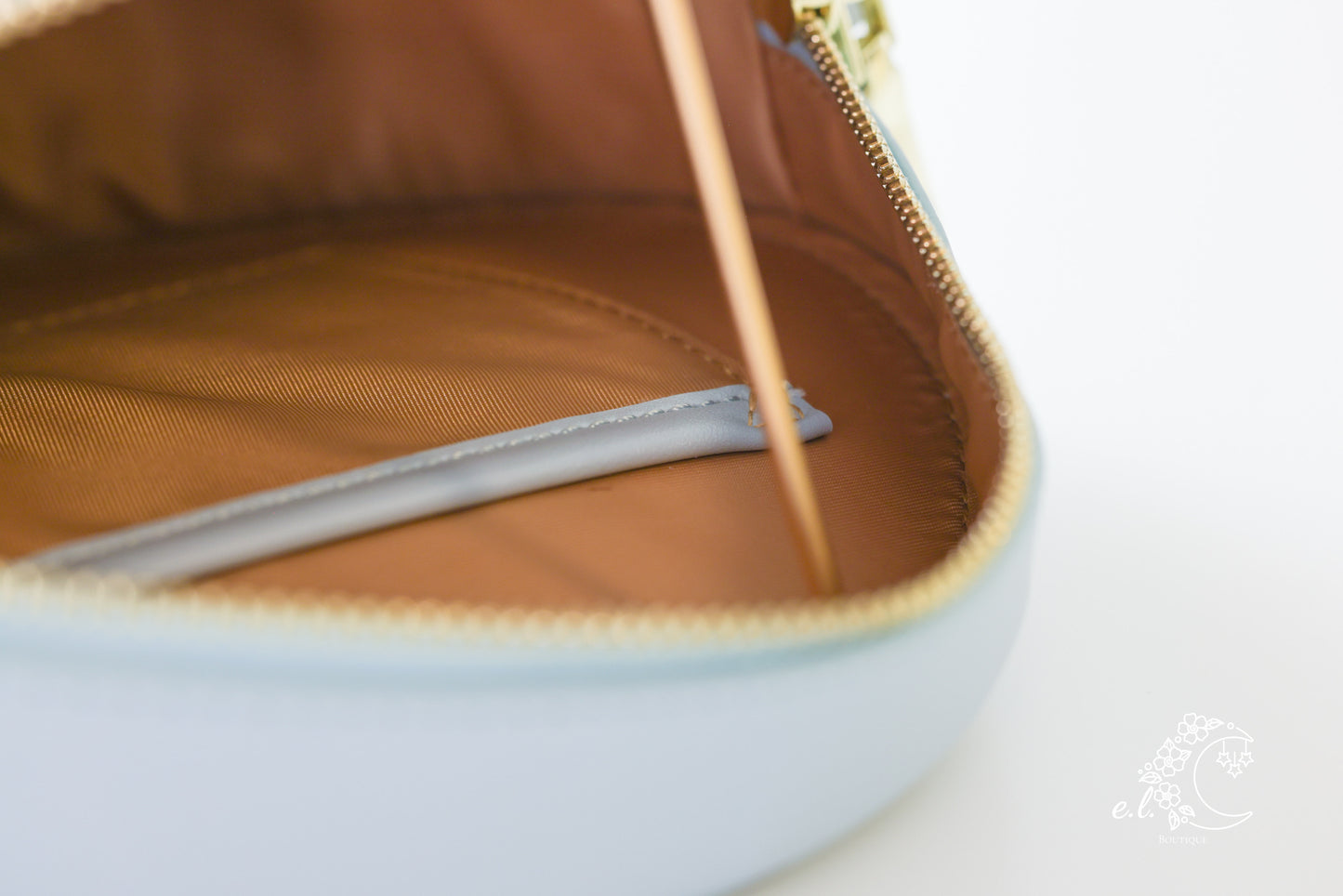 Laser Cut Elephant Foot Round Crossbody