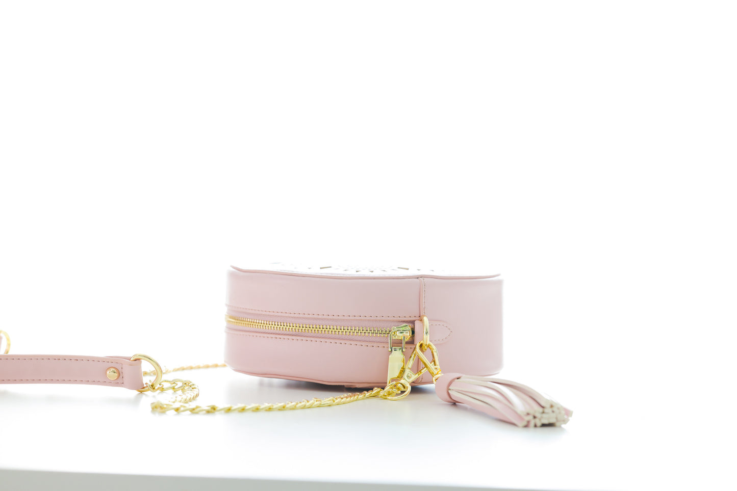 Laser Cut Elephant Foot Round Crossbody
